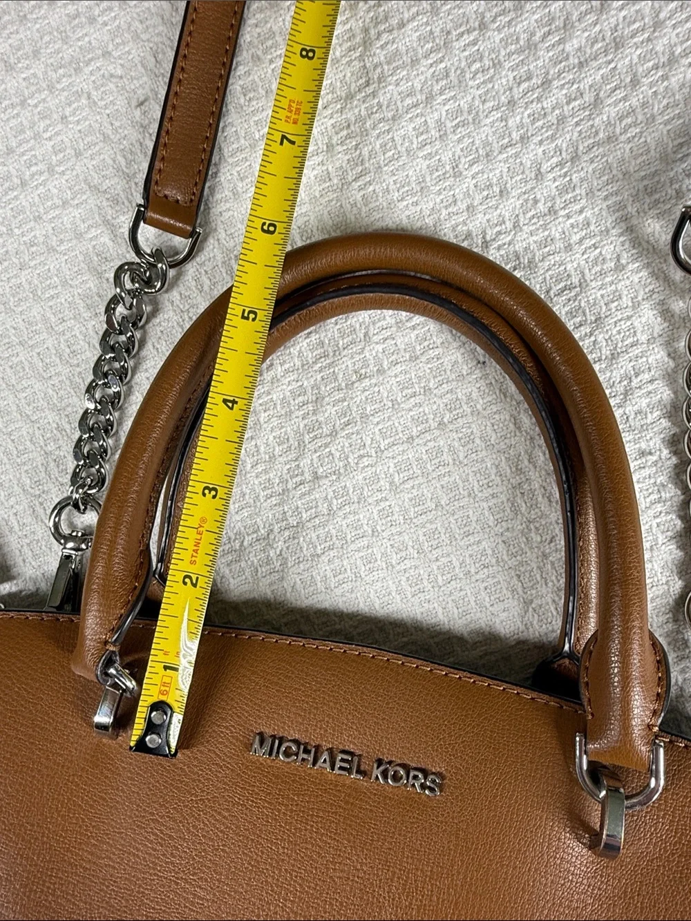 Michael Kors saddle tan saffiano leather satchel with silver hardware